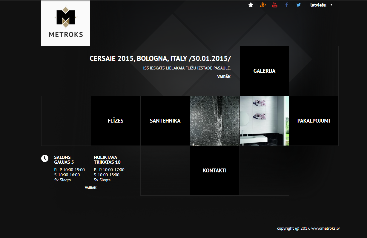 Legacy homepage layout with tile-based navigation to key sections like tiles, services, gallery, and contacts.